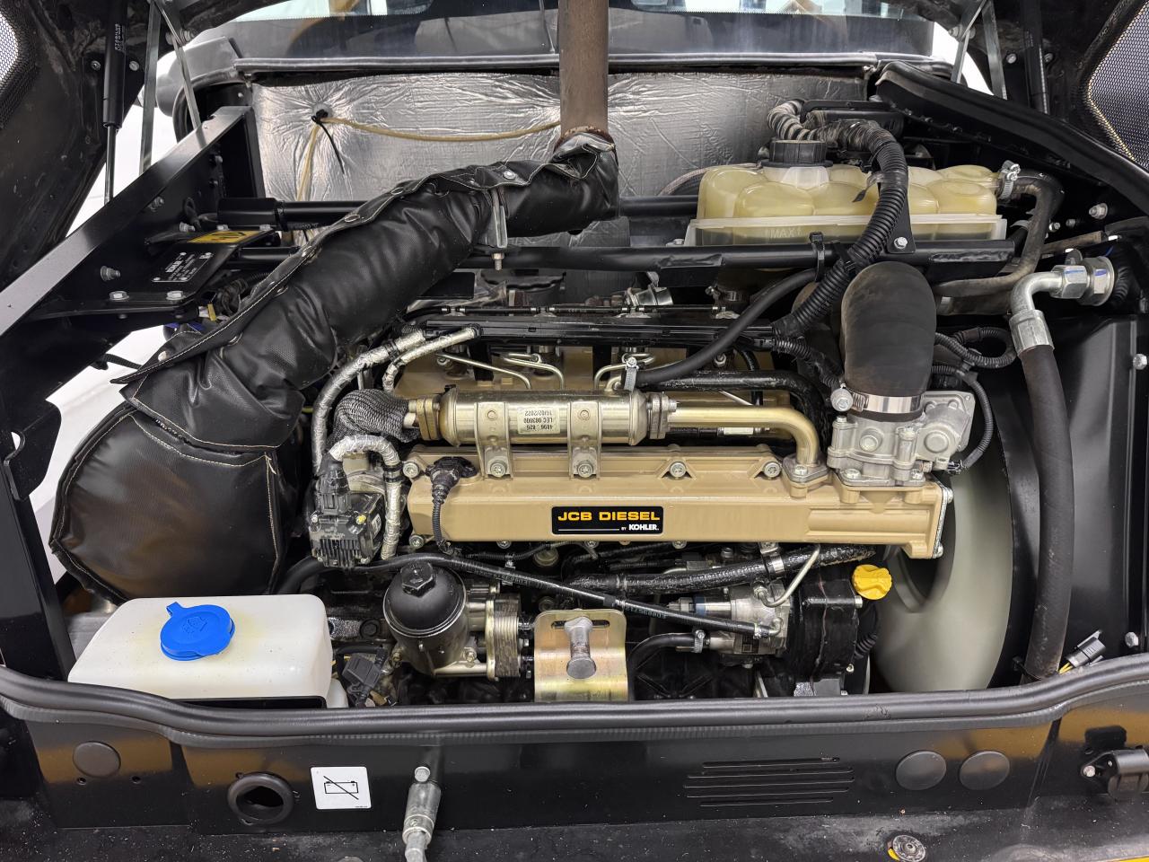 Bild på JCB 409 Med ny planerskopa