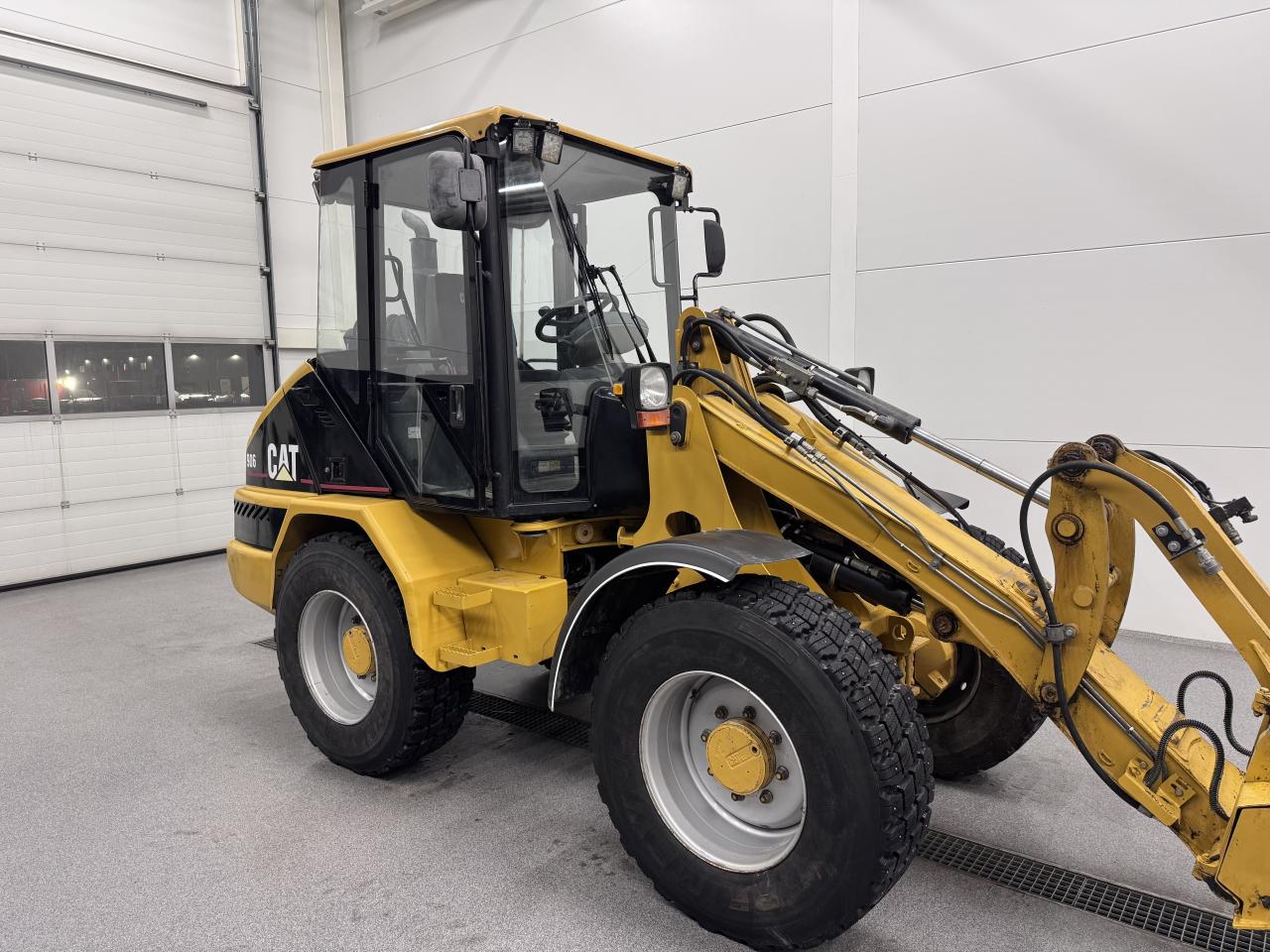 Bild på Cat 906 med redskap