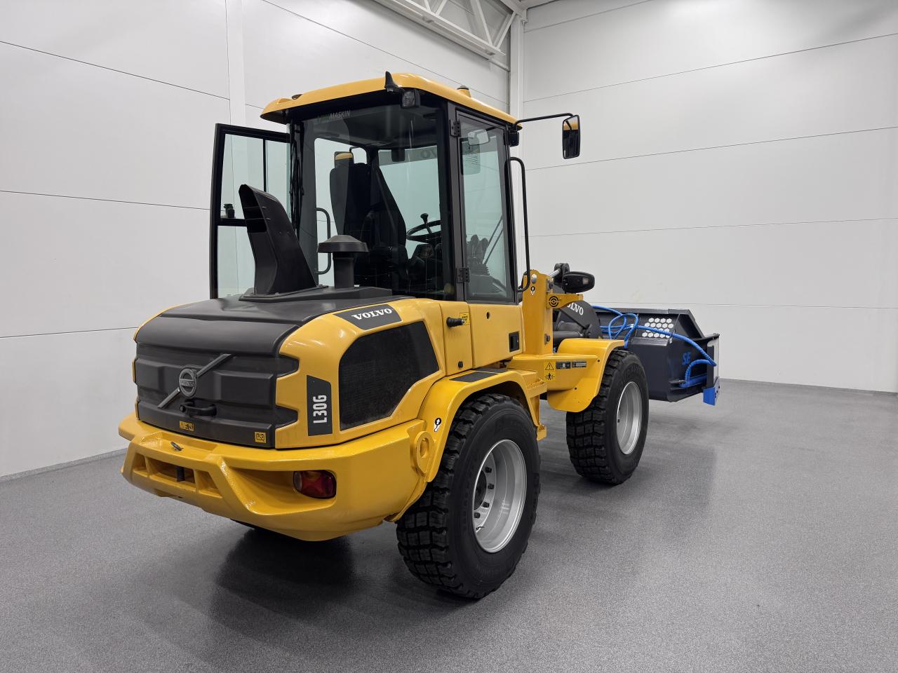 Bild på Volvo L30G med klaffskopa